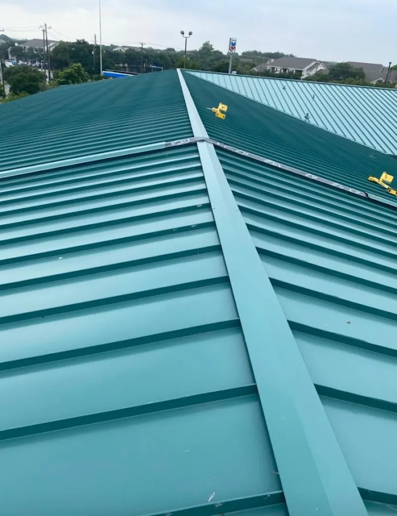 Green commercial metal roof ridge and valley for Metal Roof Repair in Belton